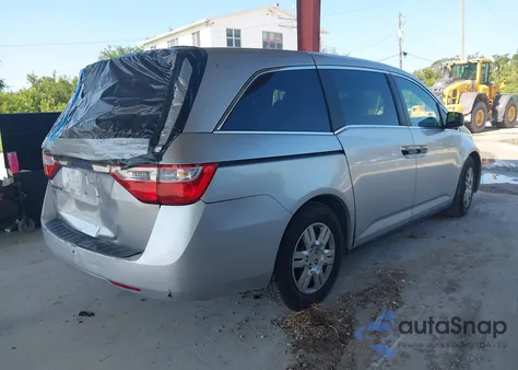 2011 Honda Odyssey Lx z USA, uszkodzony, nr VIN 5FNRL5H21B039266